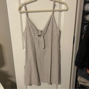 BEIGE AND BLUE STRIPED DRESS.